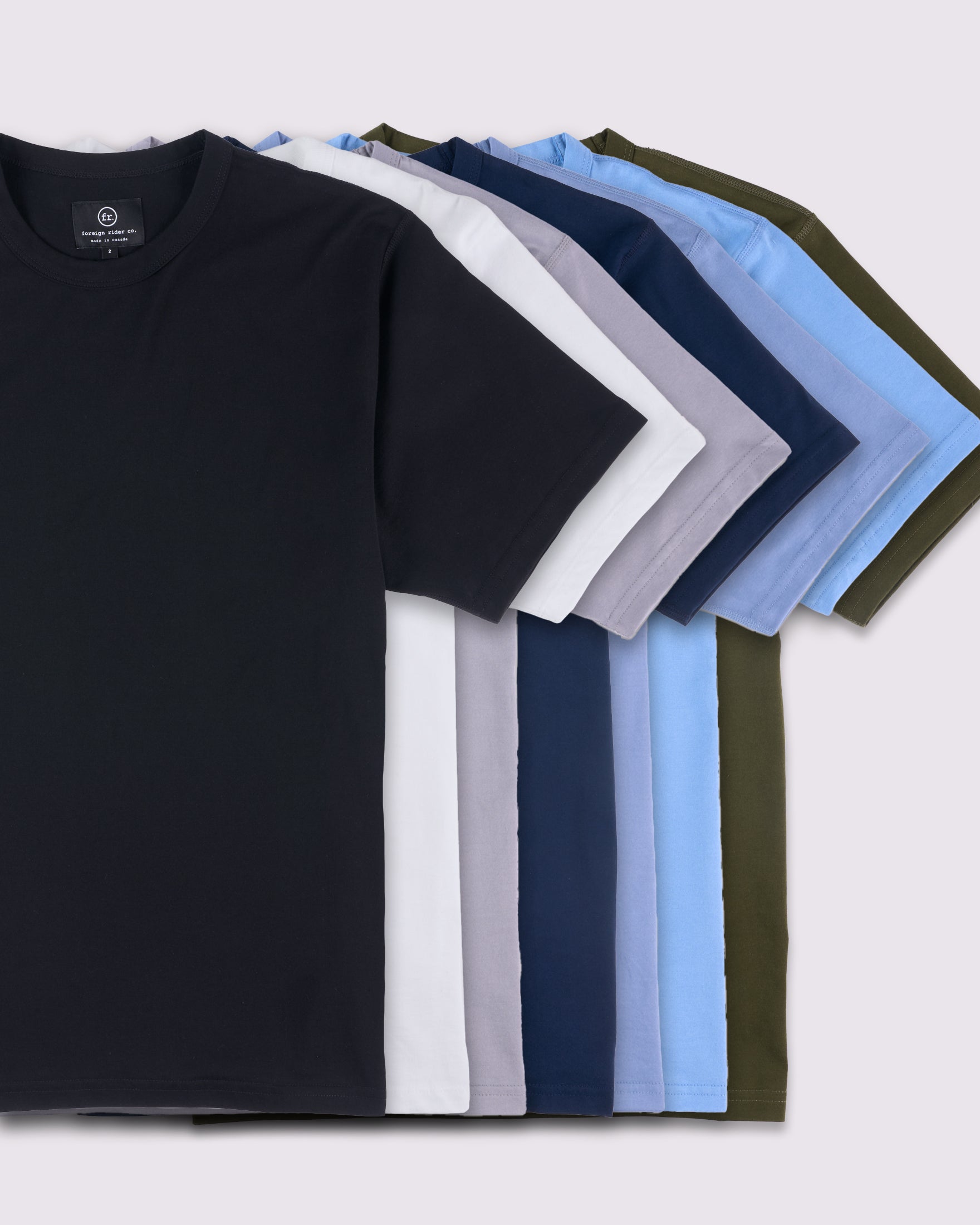 Cotton Supima T-Shirts laid flat on top of each other