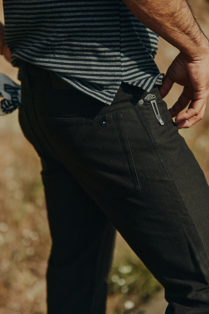 Detail shot of split side seam on the bottom of the Foreign Rider Vintage Stripe T-Shirt
