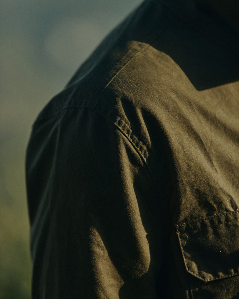 Close up of the shoulder on the Foreign Rider Co Waxed Canvas Utility Jacket