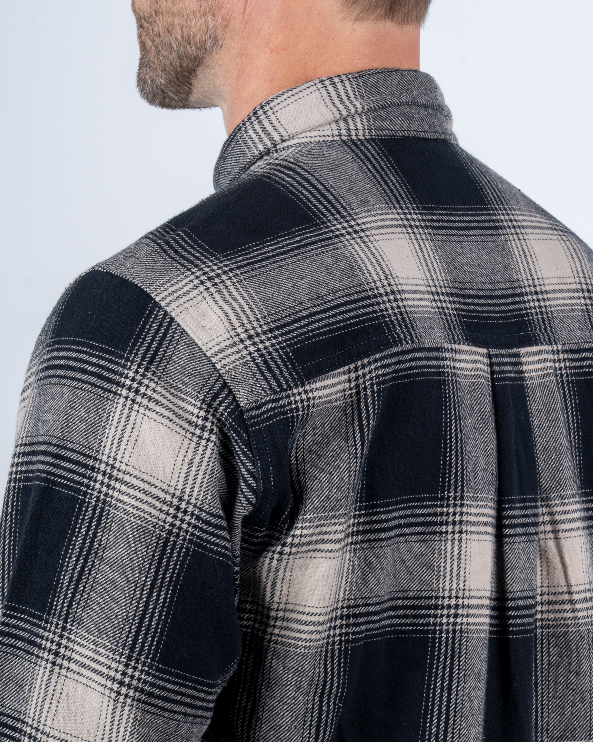 Foreign Rider Co Organic Cotton Black Flannel Plaid Long Sleeve Button Up Shirt Back Shoulder and Collar Detail