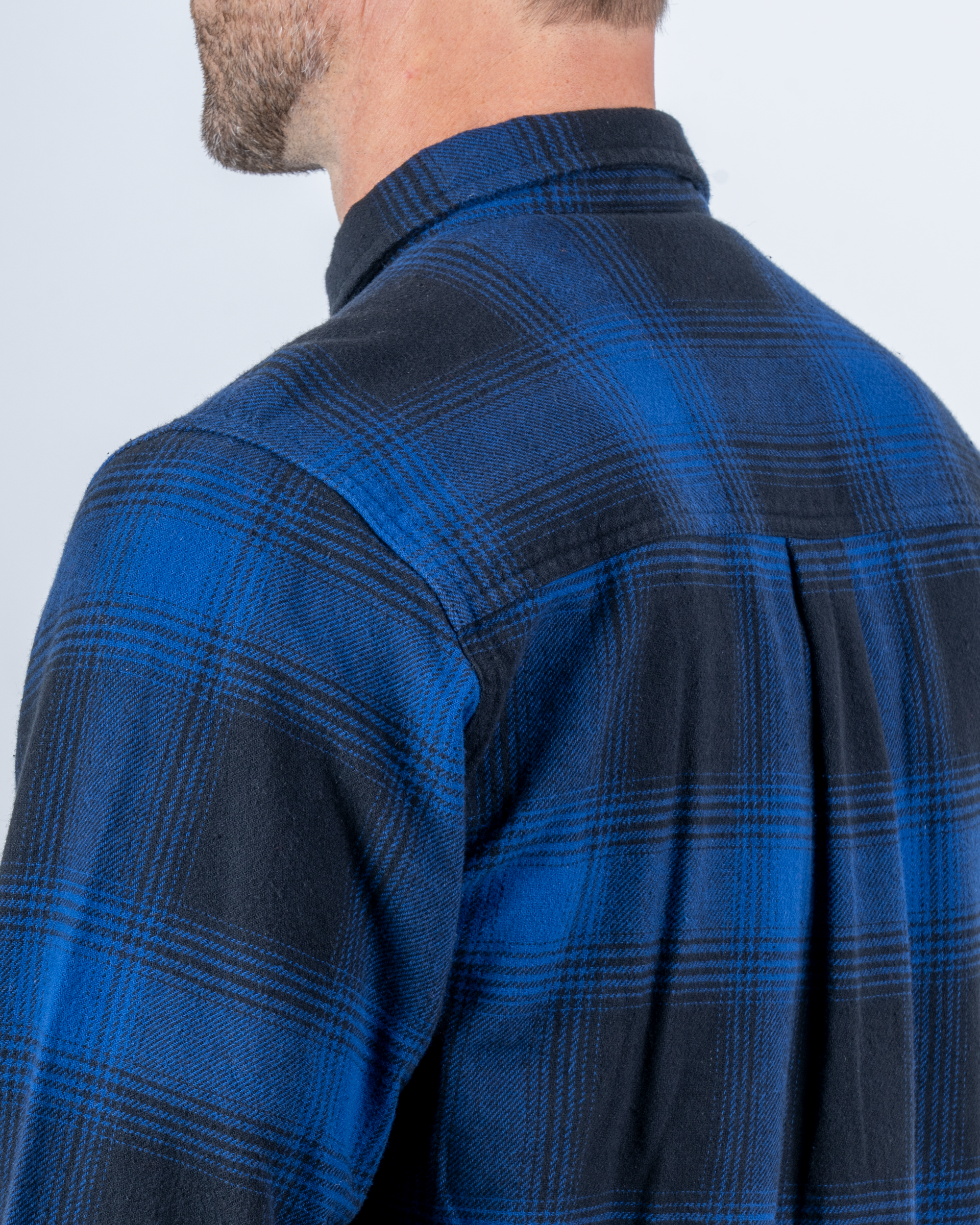 Foreign Rider Co Organic Cotton Blue Flannel Plaid Long Sleeve Button Up Shirt Back Shoulder and Collar Detail