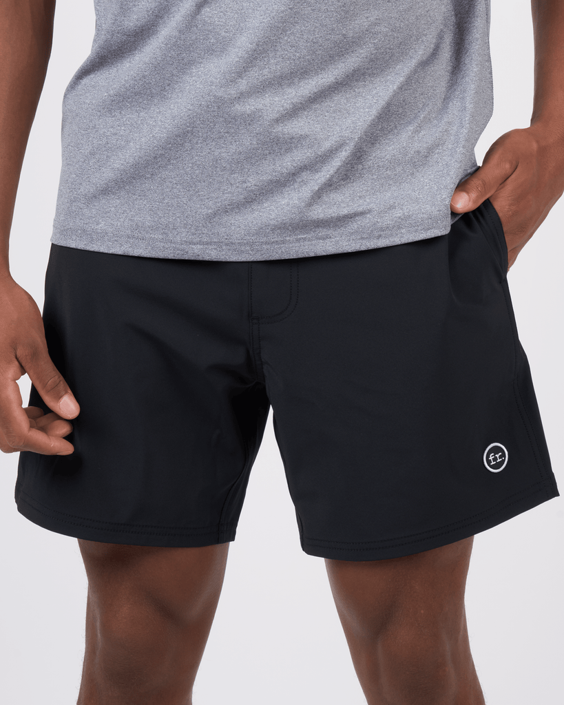 Foreign Rider Co Technical Fabric Black Boardshorts Model Closeup Front Detail