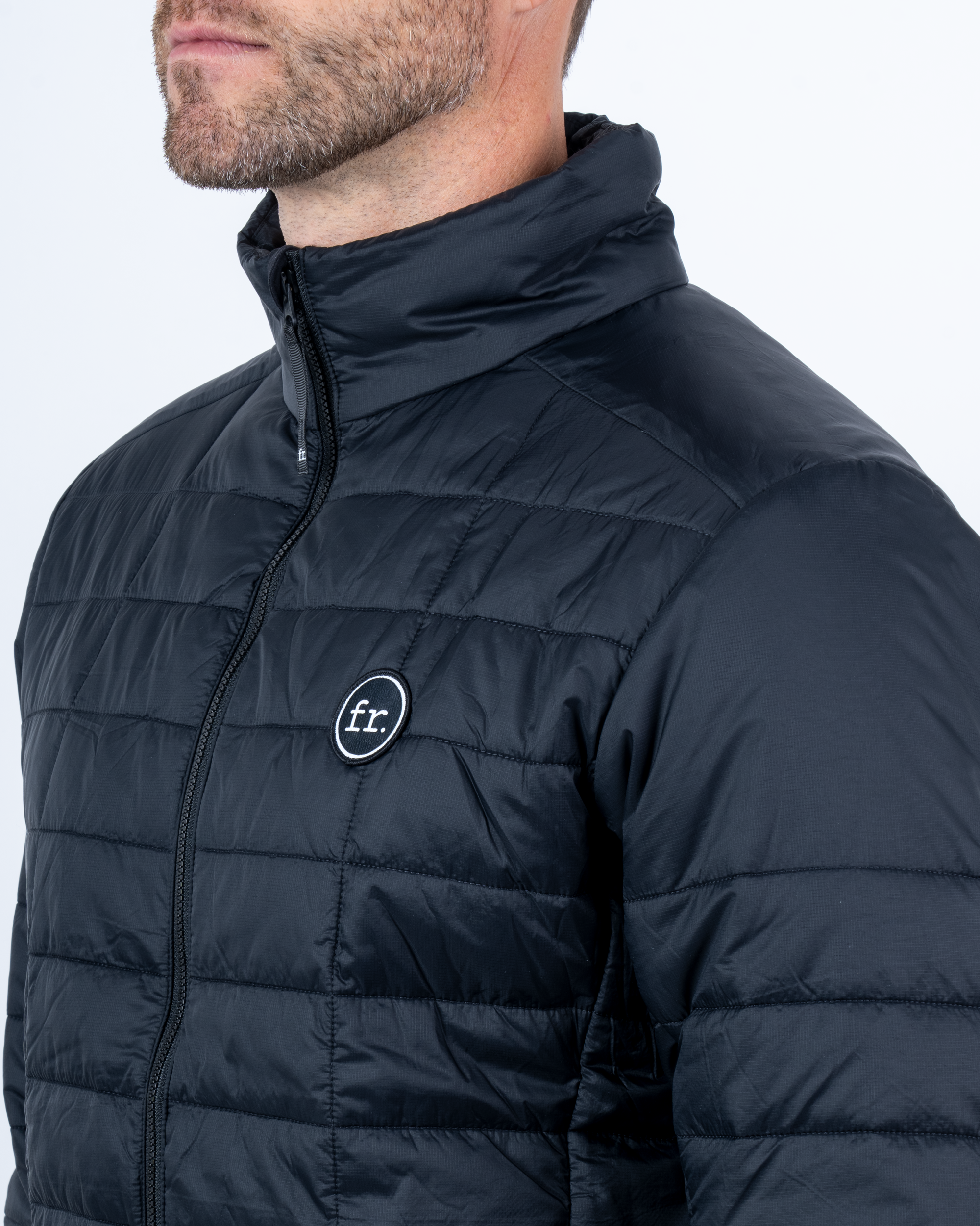 Foreign Rider Co Recycled Primaloft Gold Insulated Eco Black Jacket Chest Stitch FR Logo and Shoulder Detail