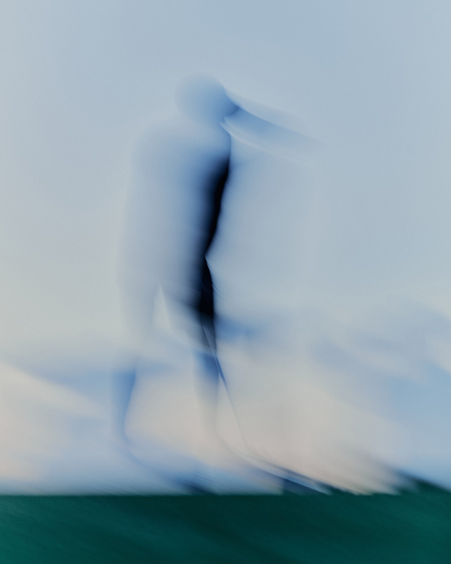 Abstract blurry image of a golfer preparing to swing at the Grove XXIII Golf Club