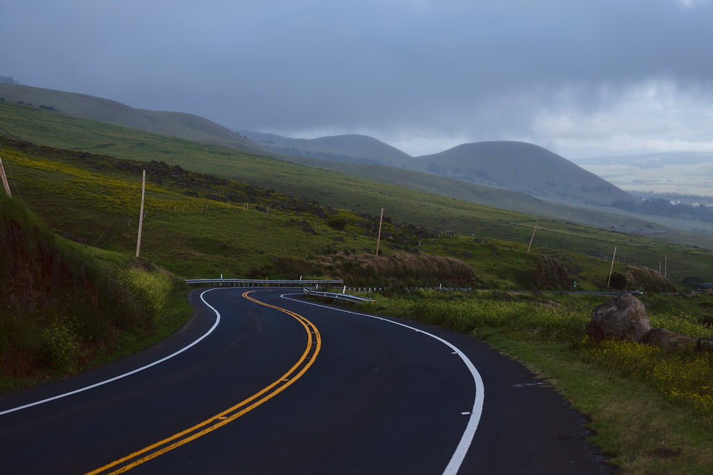 Winding road on rolling hills on Hawaii Island