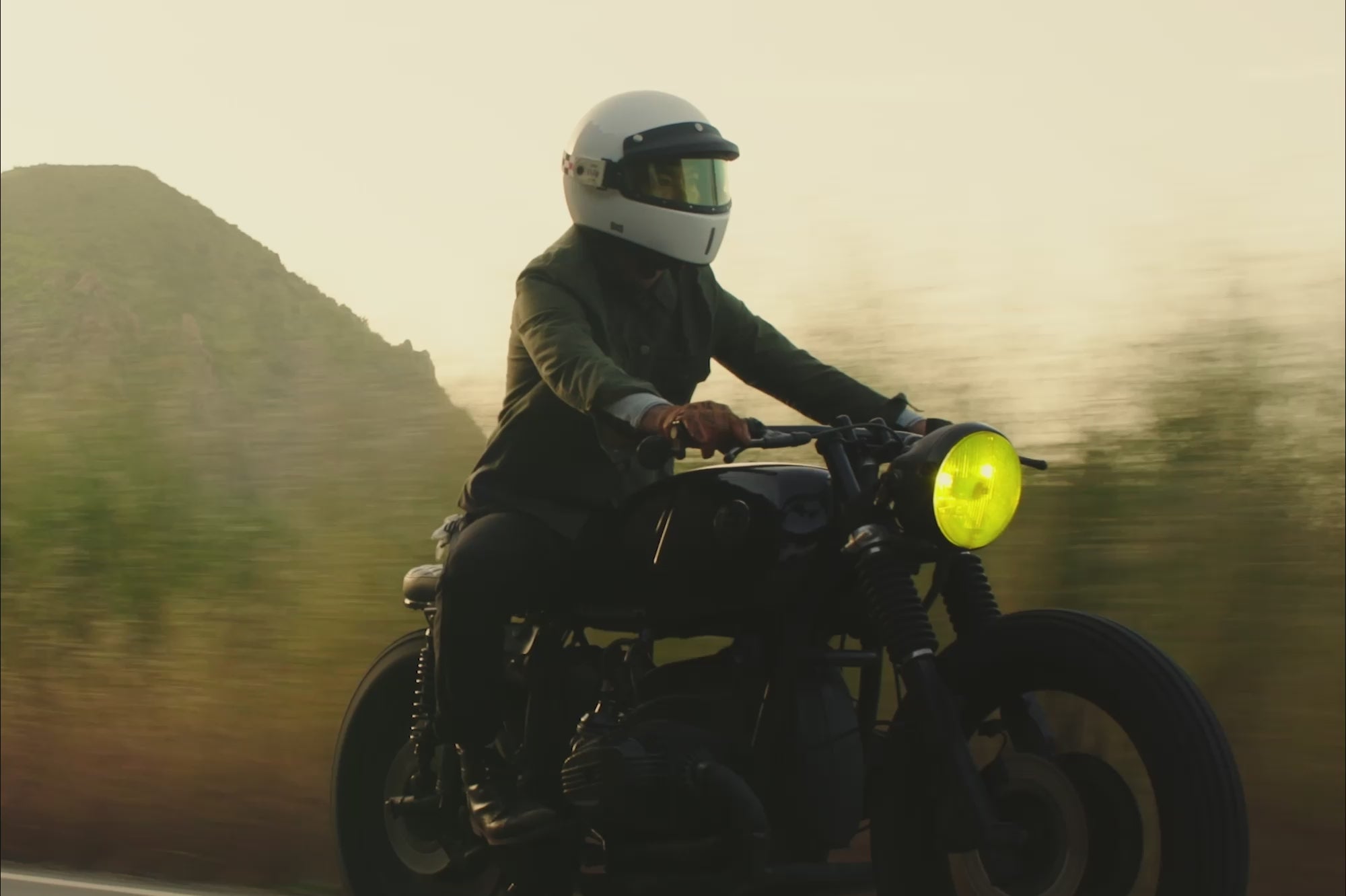 Men riding motorbikes on the Pacific Coast Highway to Malibu wearing Waxed Canvas Utility Jacket